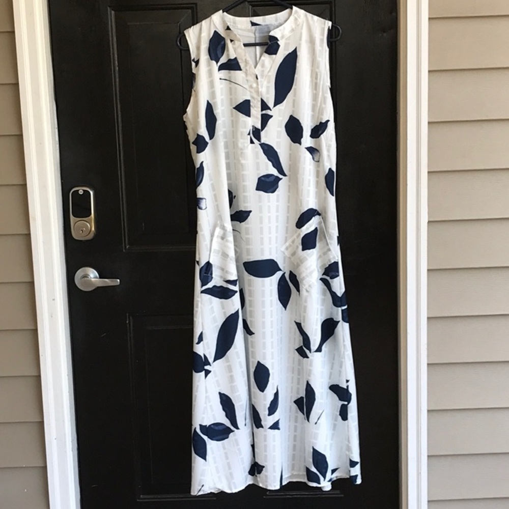 Navy blue, white , and beautiful. NWOT